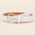 Close-up view of the white leather belt with a golden round buckle, showing fine texture details. - White