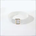 Close-up detail view of white crocodile pattern wide belt featuring stylish gold square buckle. - White Gold Button