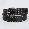 Detailed view of women black leather belt featuring punk silver studs and classic buckle - Black