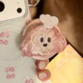 Glittery pink cartoon dog phone grip on a sparkling iPhone case - Individual Pop Socket Stand / Pink Glitter Cookie Puppy Stand
