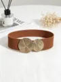 Detail view of the brown elastic waist belt featuring textured gold circular metal buckles. - Coffee