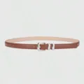 Close-up of a stylish brown women's thin belt with silver metal buckle and loops. - Camel