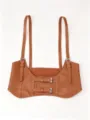 Close-up of brown faux leather suspender corset belt with silver buckles - Camel