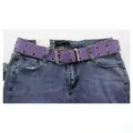 Detailed macro shot of a purple double-grommet canvas belt styled with casual denim jeans - One Size 100cm / Purple