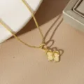 Close-up of a gold-plated necklace featuring a creative flip-flop charm pendant - Flip-flops