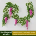 Artificial wisteria vine garland featuring purple flowers and dense green leaves - 2m 5 Strings/Pack / Fuschia
