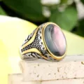 Vintage titanium steel ring with oval color-shifting gemstone and rune pattern - Size 7 / Gold-Silver Two-Tone Colorful Stone