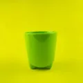 Green tripod cup detail view, cute animal shaped feet design, premium melamine daily drinkware. - Green
