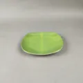 Melamine banana leaf shaped plate detail, showing realistic green botanical texture and edge. - Style 900