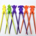 Colorful silicone cartoon training chopsticks for kids, cute baby learning flatware set. - Boy/Girl Figure - Random