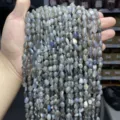 Close-up of 6-8mm natural labradorite pebble beads showing unique blue flashes and fire - 6-8mm (Approx 45-65 Pieces/Strand) / Natural Grey Moonstone Irregular