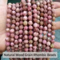 Detailed macro view of faceted pink rhombus stone beads for jewelry making - Natural Red Wood Grain Stone Rhombus Beads