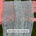 Iridescent glacier blue faceted glass rondelle loose beads for DIY jewelry making. - Glacier Blue Glass Rondelle Beads / 4x3