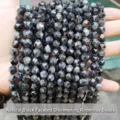 Close-up of faceted black labradorite rhomboid beads for DIY jewelry making projects - Natural Black Sheen Labradorite Rhombus Beads