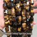 Nahaufnahme von natürlichen facettierten gelben Tigerauge-Steinperlen für DIY-Schmuck - 19 Stück/Packung (15x20x13mm) / Natürliches Gelbes Tigerauge