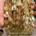 Nahaufnahme von natürlichen facettierten gelben Zitronenquarz-Kristallperlen - 19 Stück/Packung (15x20x13mm) / Natural Lemon Yellow Citrine
