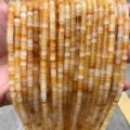 Macro view of natural yellow jade 2x4mm square spacer beads for DIY jewelry making. - Disc Shape / 155 Pieces/Strand / Natural Yellow Jade