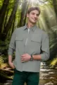 Male model wearing a grey shirt jacket standing in a sunlit forest by a mountain stream - S / Tops / Grey Green