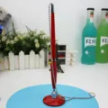 Red desk ballpoint pen with fixed circular base and secure metal chain connection - Red / Black