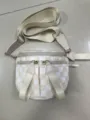 Vista detallada del mini bolso bandolera de tela Oxford a cuadros beige para mujer - Cuadros beige