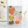 Large glitter foil heart pattern gift bag for birthday parties and festive gifting - 12 Pieces/Pack Small Size / Red Heart