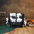 Vintage western style crossbody bag featuring a cow print flap and brass hardware. - Western Retro (PG5010) / Black