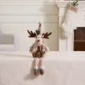 Plush brown and khaki Christmas reindeer doll decoration sitting on a white table - Sitting Long Leg Reindeer