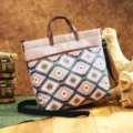 Detailed view of bohemian Aztec patterned waterproof laptop tote bag in rustic setting - Graph 4 (PG5100) / Aztec Beige Graph