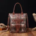Detailed macro view of vintage brown snakeskin pattern tote bag with premium leather texture. - Brown Snake Print (PG5062)