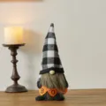 Halloween gnome doll with black and white plaid hat holding BOO banner decor - Gray Checkered Hat Style
