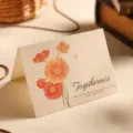 Vintage kraft paper greeting card with orange poppy flowers and Togetherness text. - Corn Poppy - Togetherness