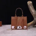 Borsa a mano vintage in stile western con inserto animalier e dettagli di nappe lunghe - Stile Mini (PG5030) / Marrone