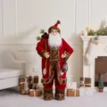 Large standing Santa Claus figurine in red velvet suit with brown fur trim holding a lantern - 30cm / Red Brown Fur Oil Lamp Style (SCD2623)