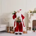 Large standing Santa Claus figurine with red coat, lantern, and gift bag for holiday decor - 30cm / Plum Sequin Green Vest Style (SCD2624)