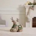 Cute brown Christmas reindeer plush doll wearing a green scarf and heart motif saddle - Lying Reindeer / 26*13*30cm / Mallow Green