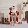 Elegant standing Santa Claus doll in red velvet coat holding gifts Christmas ornament - Plum Velvet Gift Box Style (SCD2628)