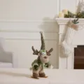 Adorable plush Christmas reindeer doll wearing a green knit hat on skis decoration - Skiing Reindeer (Pointed Hat) / Mallow Green