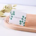 Detail of a minimalist greeting card with green leaf pattern on a decorative wooden tray - Good Luck Style / 10 Sheets Set