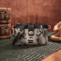 Detailed view of bohemian snakeskin print small crossbody bag with golden turn-lock clasp - Snake Black (PG5051)