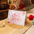 Foldable Christmas greeting card with Merry Christmas calligraphy and festive illustrations. - Pink Gradient Christmas Tree And Gingerbread Man Style (2025111702-1)