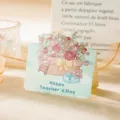Tarjeta de felicitación para el Día del Maestro con un hermoso diseño de cesta de flores - Estilo cesta cariño