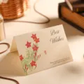 Elegant vintage kraft paper greeting card with red flower illustration and Best Wishes text - Cypress Vine - Best Wishes