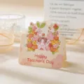 Handgezeichnete Happy Teacher's Day Grußkarte mit einem warmen Blumen-Illustrationsdesign. - Dankbar für Dich Stil