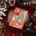Detailed view of a red Christmas card with festive Santa and tree illustrations - Red Cartoon Style (1)