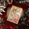 Detail of festive Christmas card with gold foil lettering and Santa illustration. - Green Santa Style (2)