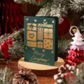 Tarjeta de Navidad retro verde oscuro con elegantes diseños festivos en pan de oro - Estilo Guirnalda de Muñeco de Nieve / Verde