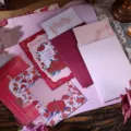 Detailed view of vintage oil painting style letter paper and envelopes with rose floral patterns - Random Set of 5 Styles (5 Envelopes + 10 Letter Papers)