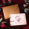 Vista detallada de tarjetas de Navidad vintage con muñeco de nieve y sobre kraft - Muñeco de Nieve