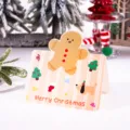 Retro Christmas card with a cute gingerbread man and festive dog illustration - Gingerbread Man
