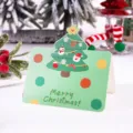 Vintage green Christmas greeting card with illustrated tree and Merry Christmas text - Christmas Tree